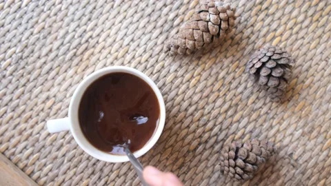 A hand is stirring a spoon of coffee Stock Footage 144839461