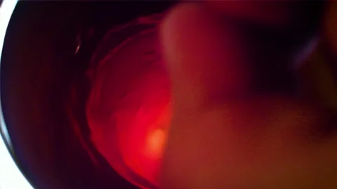 Hand stirring tea or coffee, making large funnel. Top view close up. Stock Footage 162407435