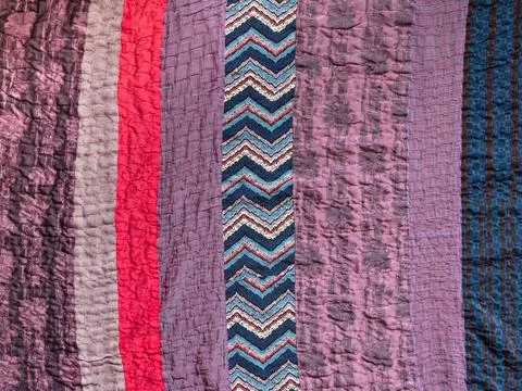Hand stitched patchwork cloth from fabric stripes Stock-Fotos