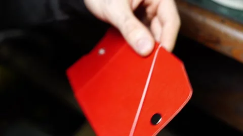 Hand Stitching Red Leather Wallet with White Thread Stock Footage 314962465