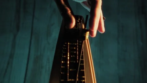 Hand Stopping The Moving Metronome Stock Footage 301914893