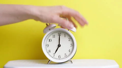 The hand stops the alarm clock at seven o'clock in the morning. Stock Footage 231556696