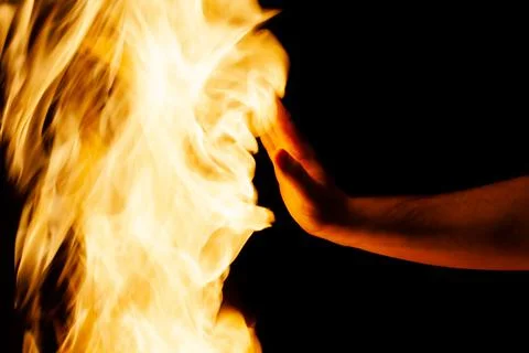 Hand stops fire, fire safety, use as background Stock Photos