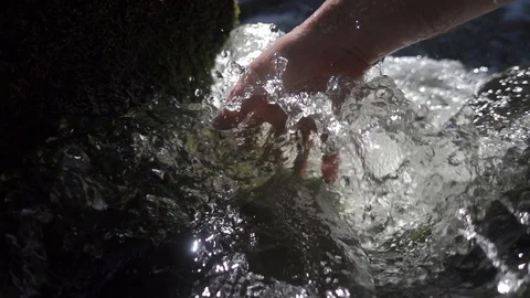 Hand in the stream of water. Stock Footage