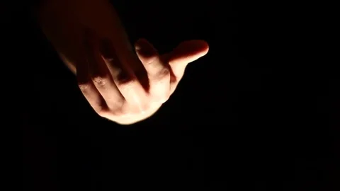 Hand stretches out to grab Video stock 83401260
