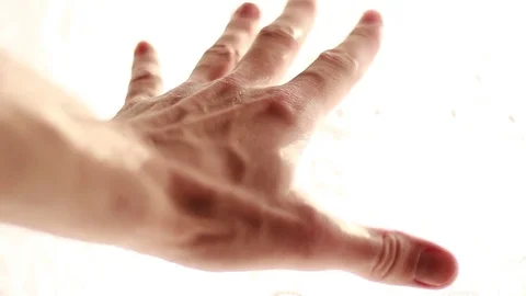 Hand stretching to the sunlight 스톡 동영상 73506277