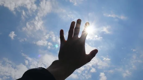 Hand to sun Stock Footage 77526423