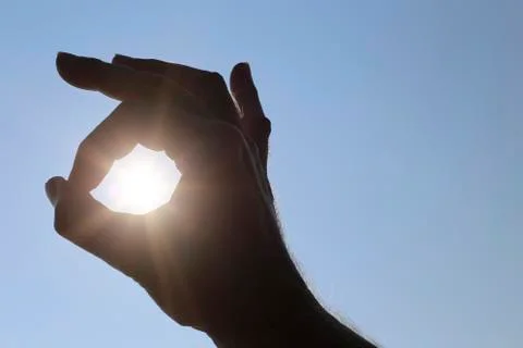 Hand sun Stock Photos