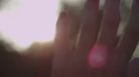 Hand in Sun Rays Stock Footage 39017291