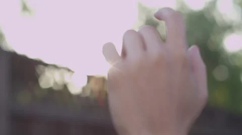 Hand in Sun Rays Stock Footage 39017748
