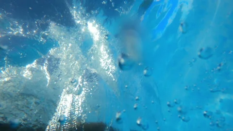 Hand in the swimming pool 스톡 동영상 137601199