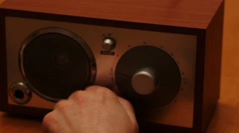 Hand switch on and tune the favorite radio 4k Stock Footage 45290883