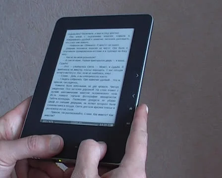 Hand switches page ereader Stock Footage 24821959