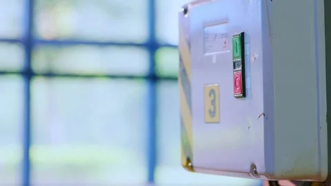 Hand Switching Circuit Breaker on Electrical Panel Close Up Stock Footage 327573210