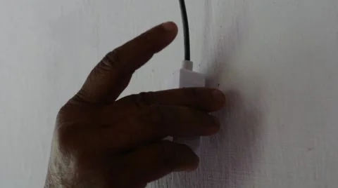 Hand switching the light on and of Stock Footage 60224321