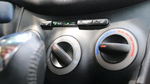 Hand switching the ventilation modes in car 스톡 동영상 87227335