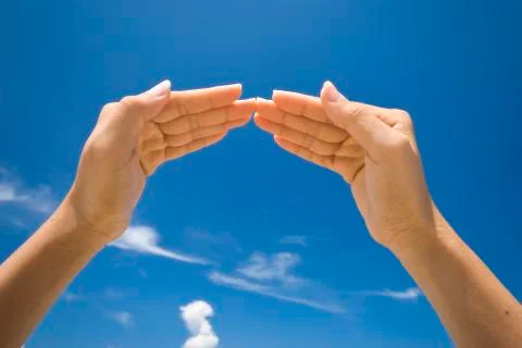 Hand symbolizing house Stock Photos