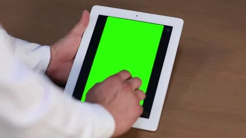 HAND TABLET GREEN SCREEN Stock Footage 136064928