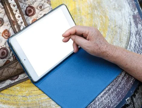 Hand with tablet Stock Photos