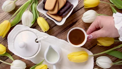 Hand take a coffee cup from a tray top view Stock Footage 150869912