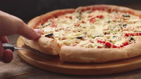 Hand take hot pizza slice with stretching cheese close up Stock Footage 116104305