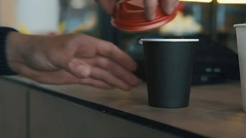 Hand take out coffee cup from table, grab and go Stock Footage 119236813