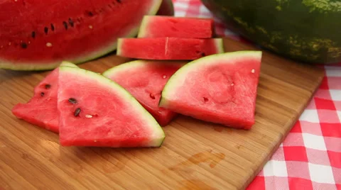 Hand take slice of fresh watermelon Stock Footage