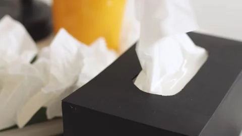 Hand take tissue from holder. Concept, crying, sadness, paper napkins. Close up Vídeo Stock 239756401