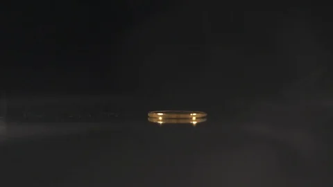 Hand takes bitcoin on a glass table Stock Footage 100896336
