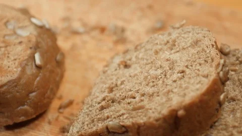 Hand takes bread. Video stock 82669692