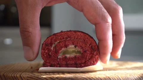 Hand takes the cake 4K Video stock 162322010