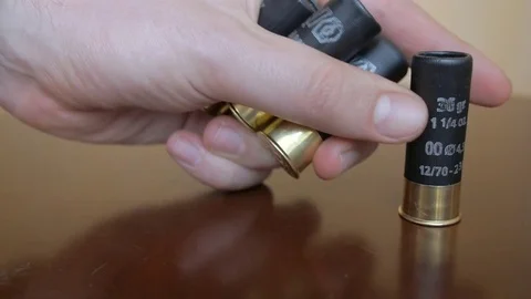 The hand takes cartridges Stock Footage 76403307