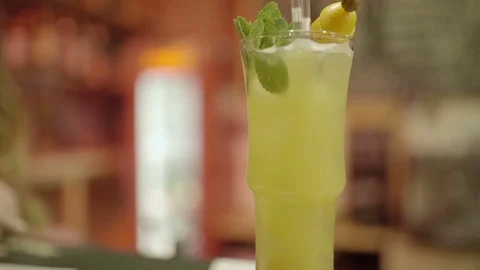 Hand takes cocktail close-up Stock Footage 76565585