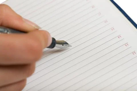 Hand takes notes Stock Photos