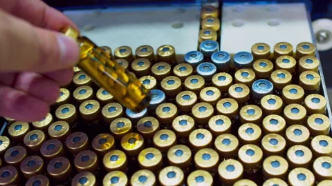 A hand takes one of many identical vials for quality control. Close-up. 스톡 동영상 293197238