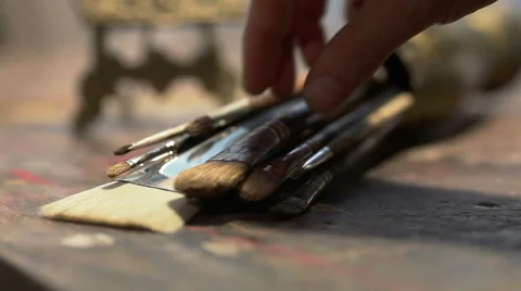 Hand takes the Paint Brushes Stock Footage 60960744