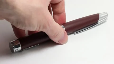 Hand takes the pen Video stock 12357088