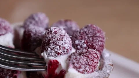 A hand takes a piece of dessert with a fork Stock Footage 168341957