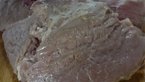 Hand takes of raw meat. Stock Footage 130489735