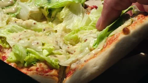 The hand takes a slice of pizza from the box Video stock 281441945