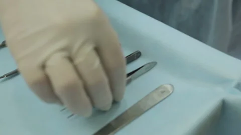 Hand takes a surgical tools Stock Footage 86329526
