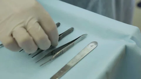 Hand takes a surgical tools Stock Footage 86329531