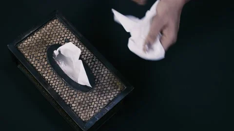 Hand takes a White Tissue Video stock 131563065