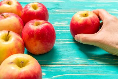 Hand Taking Apple Background / Hand Taking Apple Stock Photos