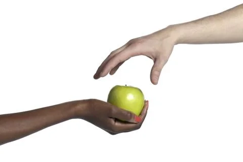 A hand taking the apple Stock Photos