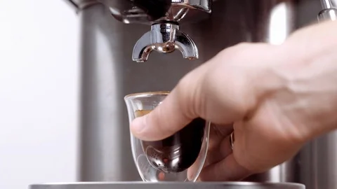 Hand taking away coffee cup. Barista using espresso making machine. Stock Footage 112678753