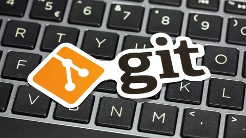 Hand taking away Git logo, writing the git clone command, keyboard closeup Stock Footage 143015581