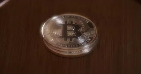 Hand Taking Bitcoin From Stack On The Table One By One. - close up Stock Footage 197629158