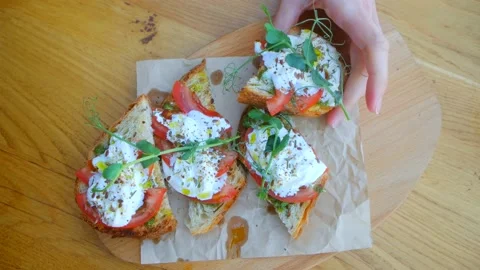 Hand taking the bruschetta Stock-Footage 239369148