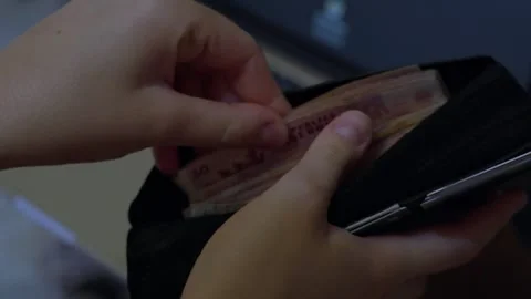 Hand taking cash from wallet for payment Stock Footage 341766470